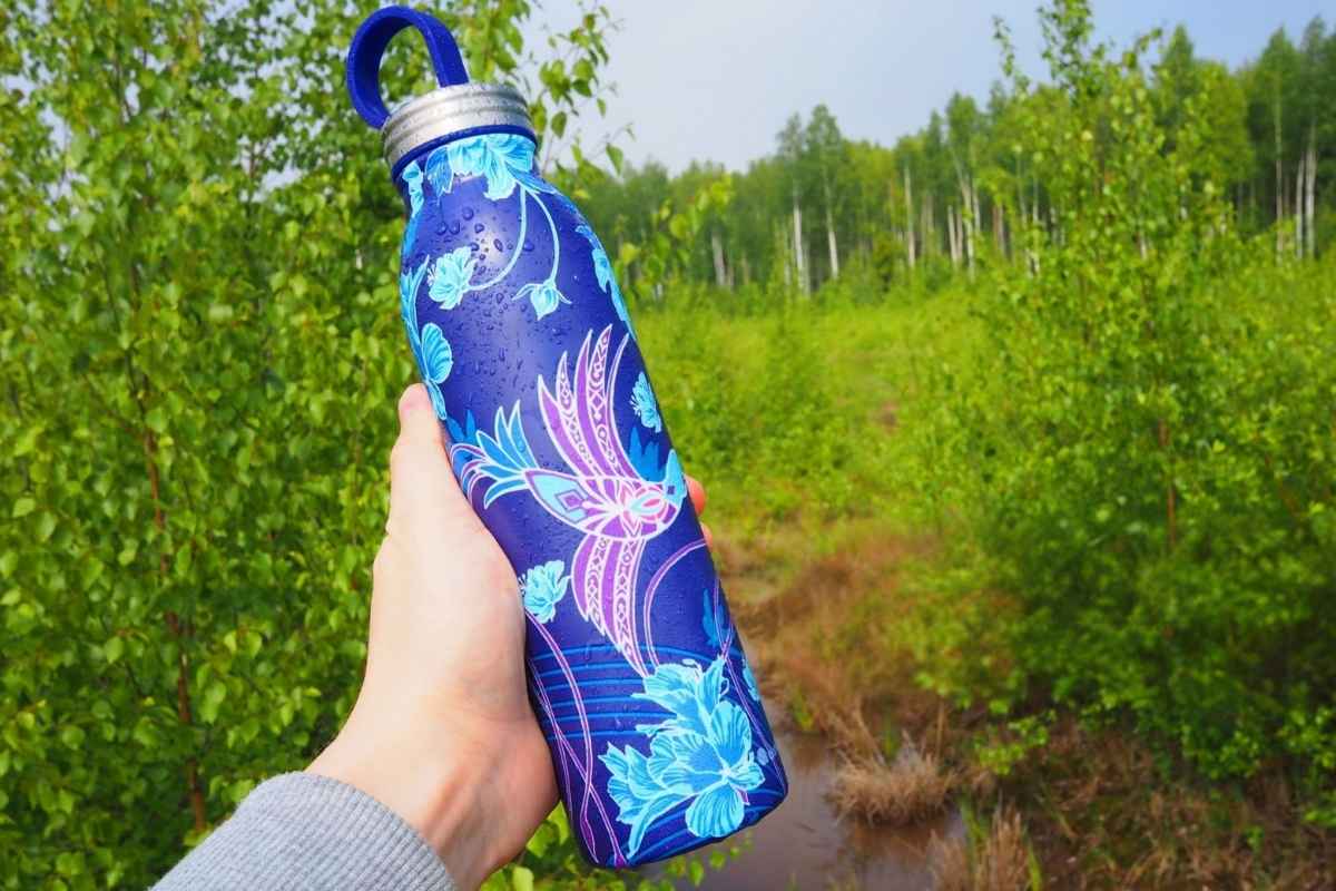 A person holding custom printed eco stainless bottle