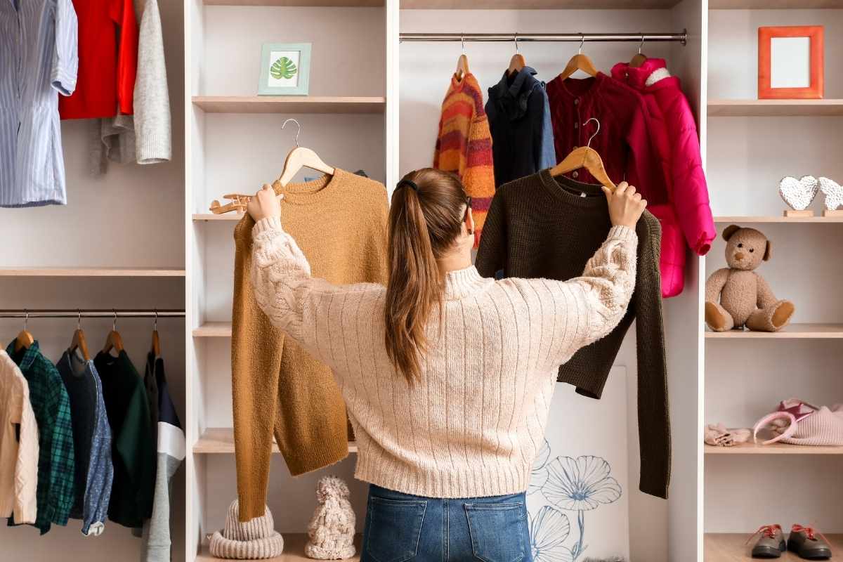 A woman organizing her wardrobe