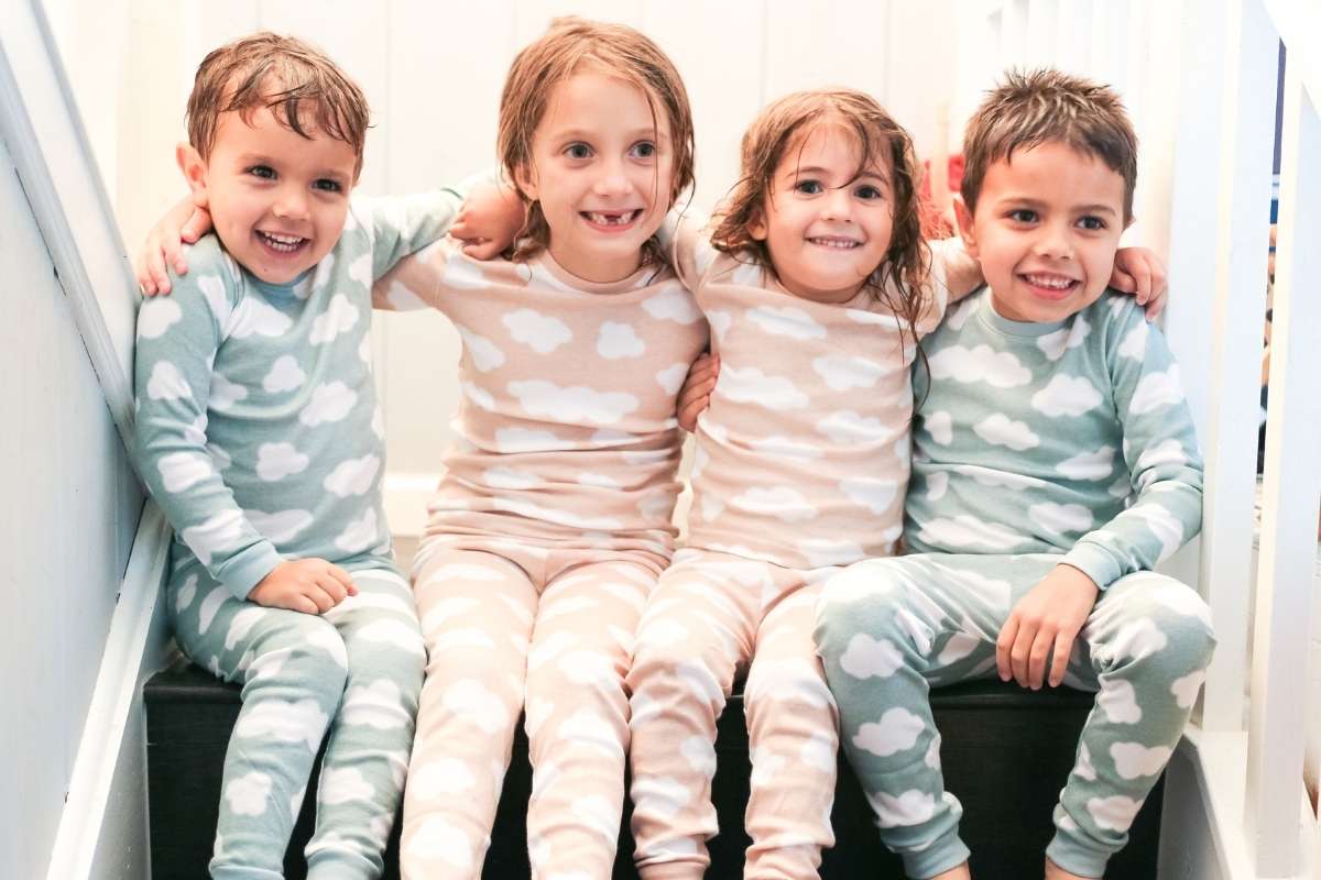 Kids wearing matching pajamas