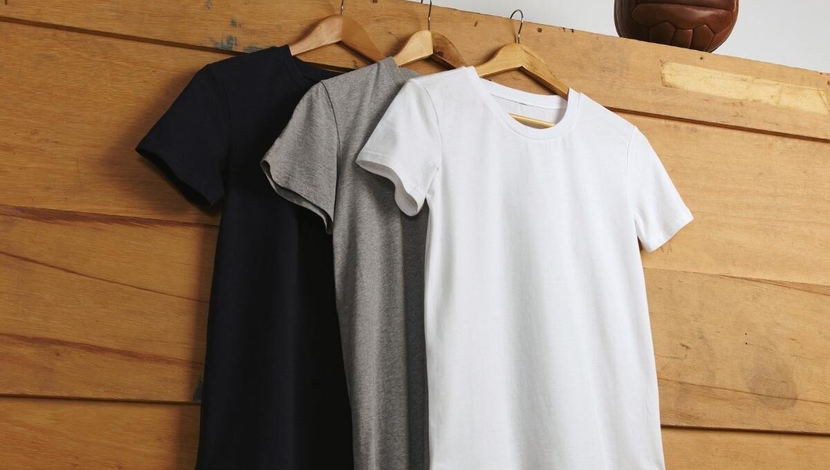 Three blank t-shirts are shown in the image, placed next to each other