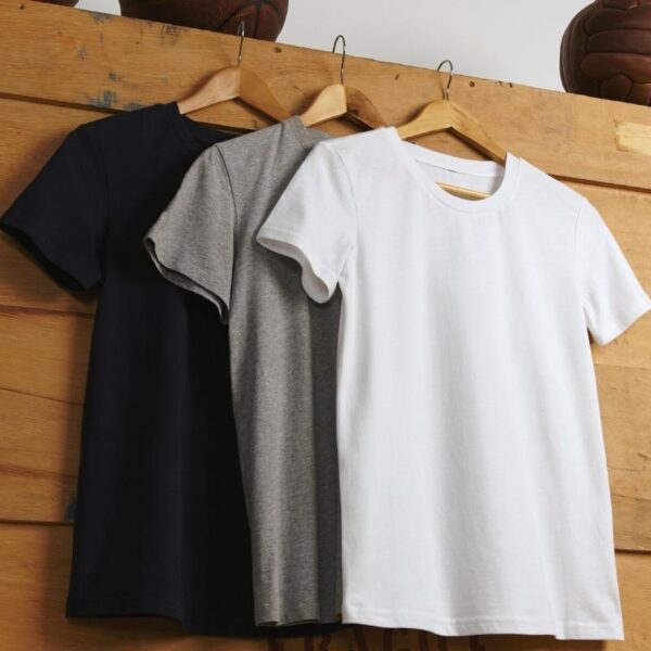 Three blank t-shirts are shown in the image, placed next to each other