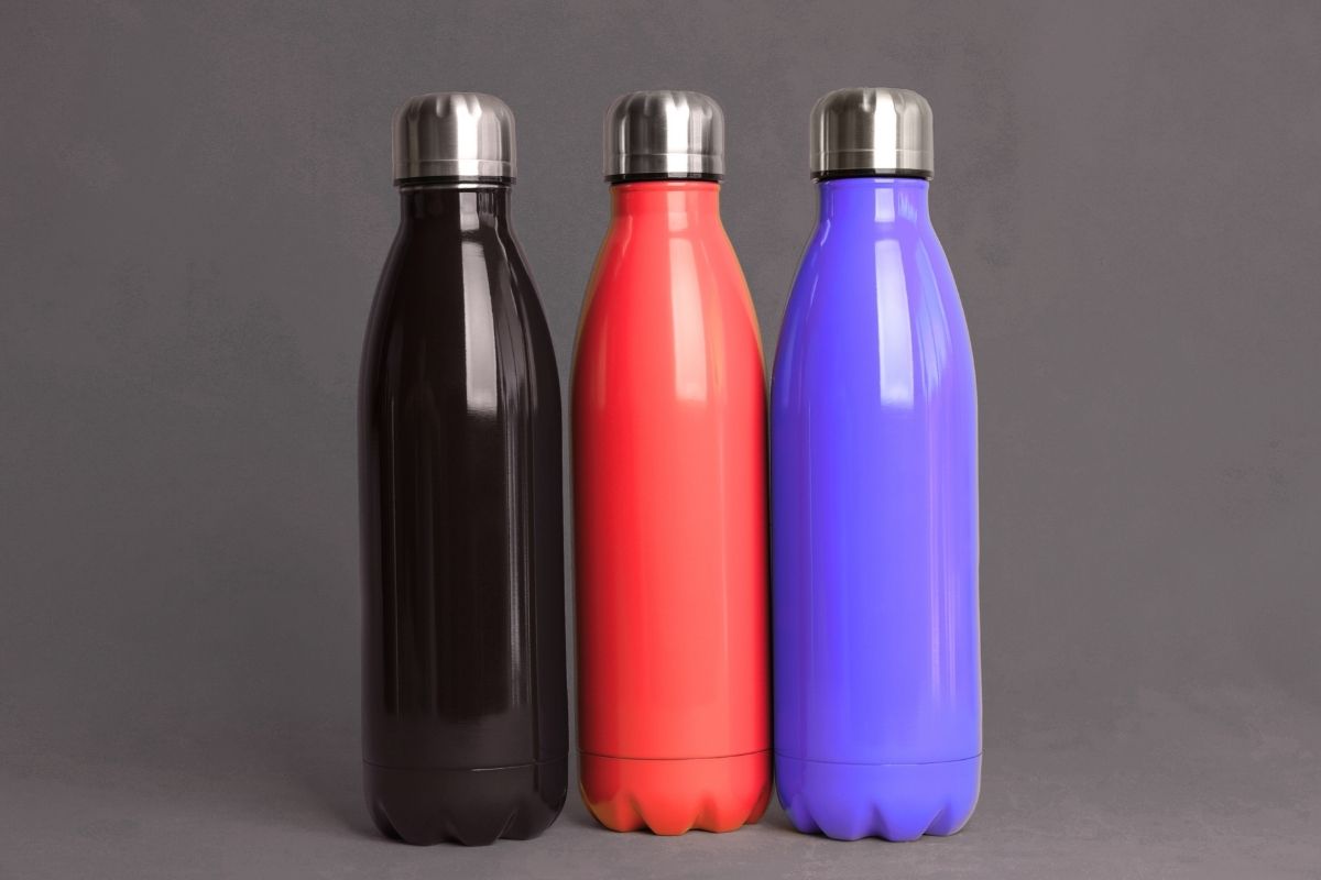 Three insulated water bottles kept with each other