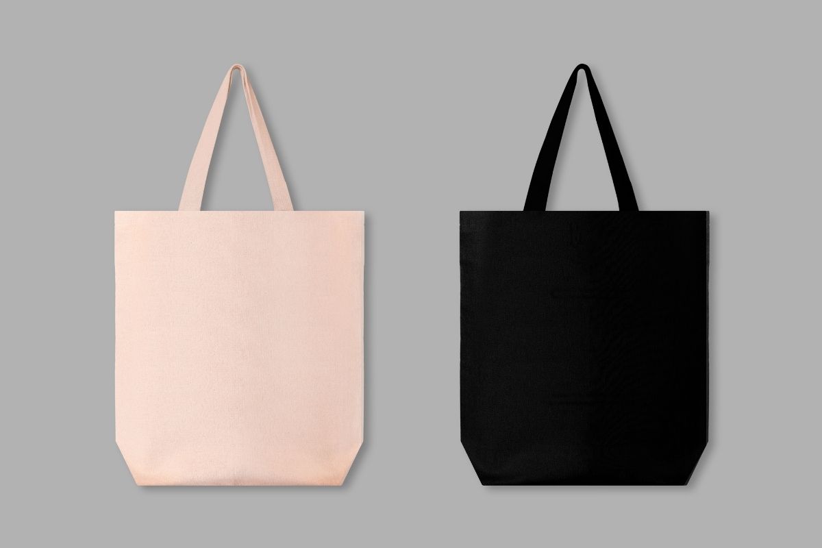 Two custom statement tote bags kept with each other